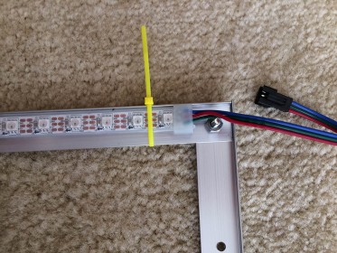 Mounting LED strands on the frame